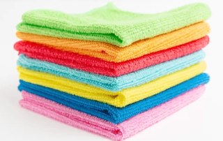 stack of multi-colored microfiber cloths